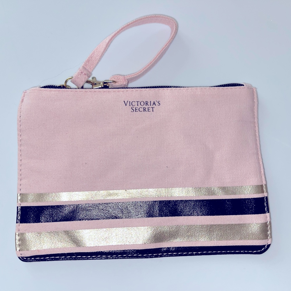 Pink and gold wristlet.